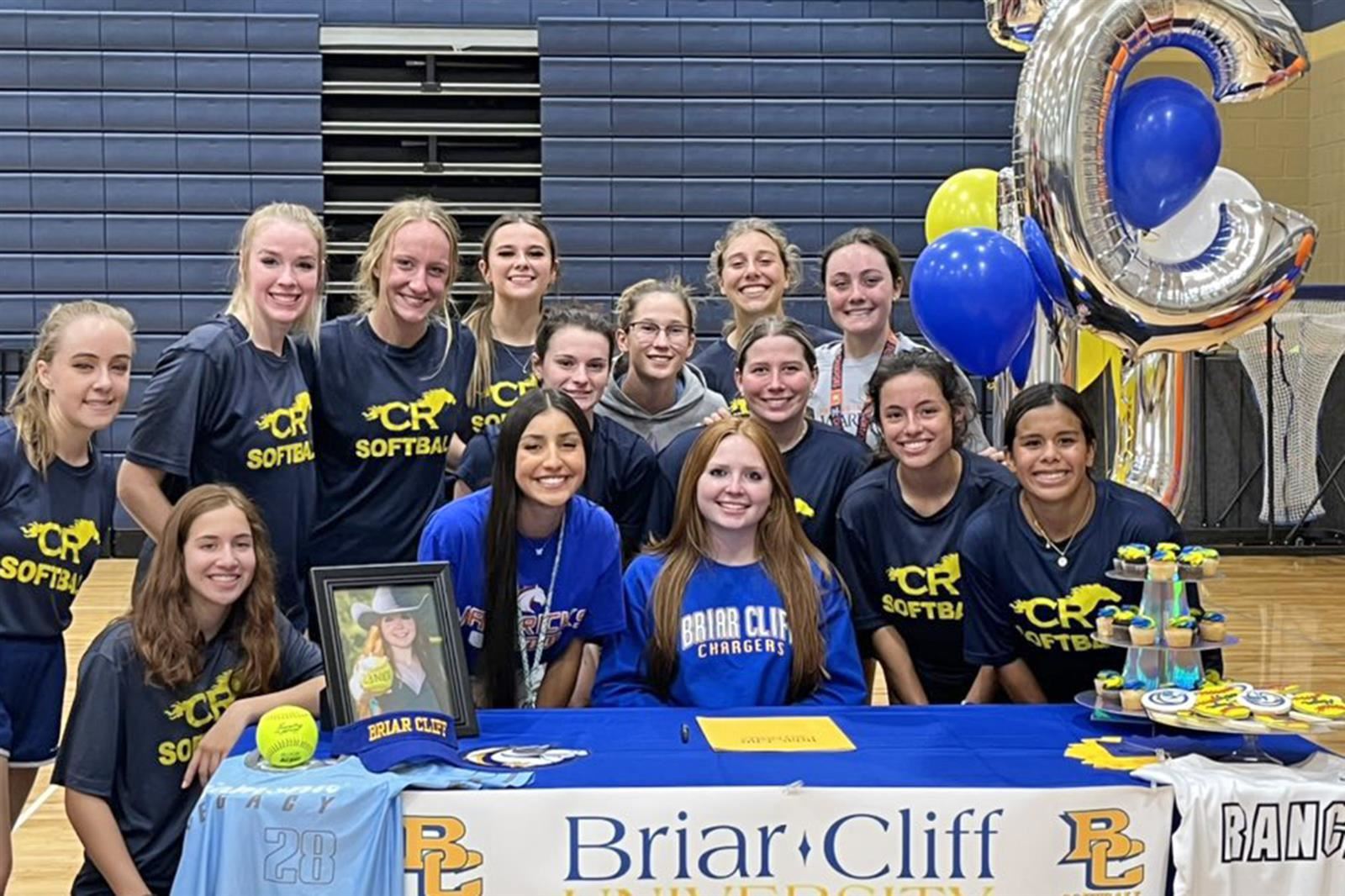 Cypress Ranch senior Alyson Greenlund, seated, signed a letter of intent to play softball at Briar Cliff University.